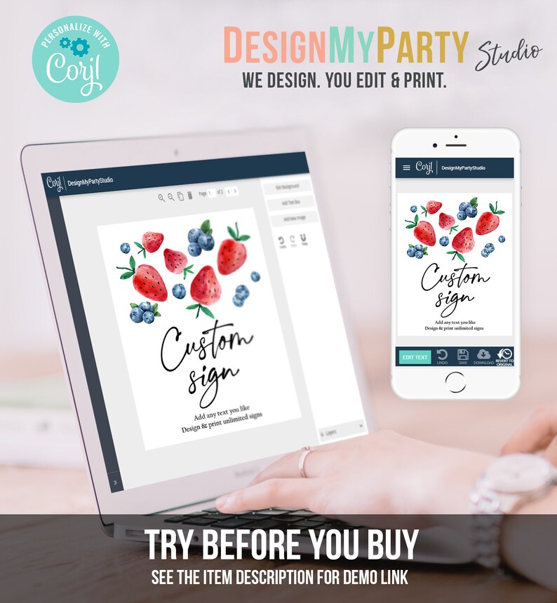 May include: A laptop screen displaying a design template for a custom sign with strawberries and blueberries. The text on the sign says "Custom Sign" and "Add any text you like. Design & print unlimited signs". The screen is on a desk with a hand hovering over the keyboard. A smartphone is in the background displaying the same design template.