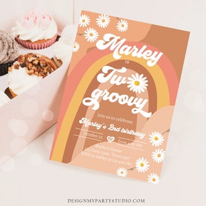 May include: A birthday invitation with a retro design. The invitation features a rainbow, daisies, and the text "Marley is Two Groovy." The invitation also includes party details such as the date, time, and location.