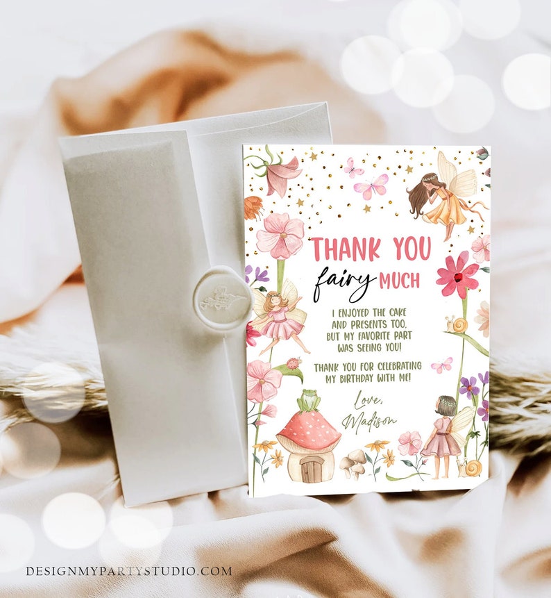 May include: Thank you fairy much card with a pink and green fairy theme. The card features a mushroom house, fairies, flowers, and butterflies. The text on the card reads "Thank you fairy much. I enjoyed the cake and presents too, but my favorite part was seeing you! Thank you for celebrating my birthday with me! Love, Madison."