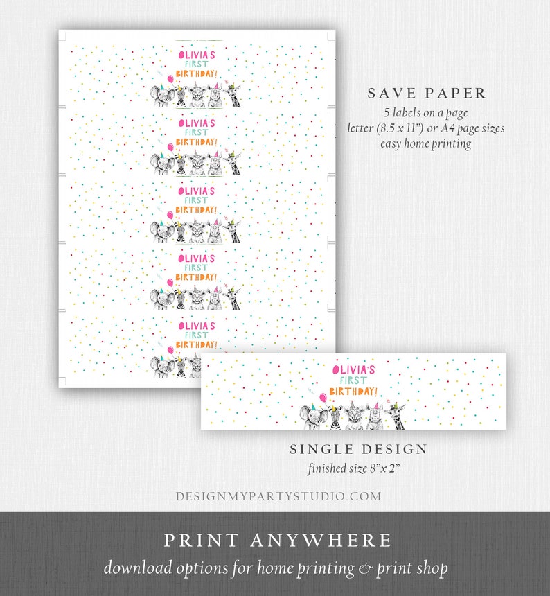 May include: Printable labels with a white background and colorful confetti. The labels feature a black and white illustration of animals wearing party hats and the text "Olivia's First Birthday!" in pink and black. The labels are designed to fit on 8.5 x 11 inch paper and can be printed at home.