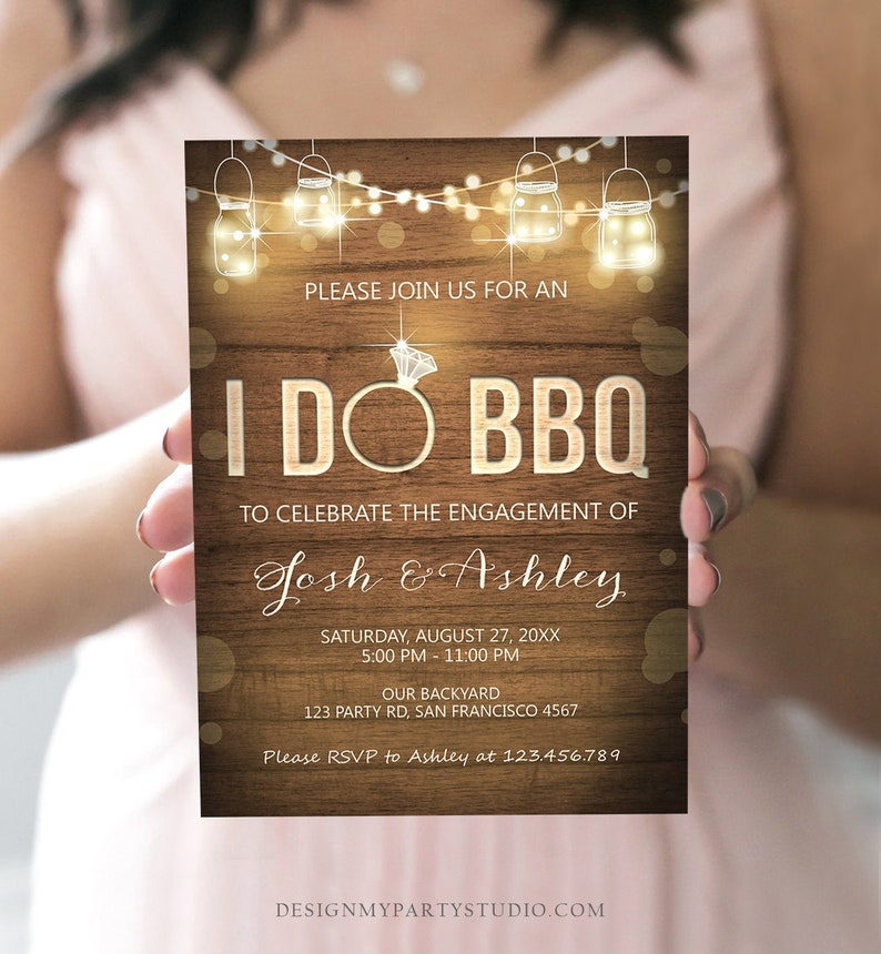 May include: A rustic wood-grain background with a white text overlay. The text reads "Please join us for an I DO BBQ to celebrate the engagement of Josh & Ashley. Saturday, August 27, 20XX 5:00 PM - 11:00 PM Our Backyard 123 Party Rd, San Francisco 4567 Please RSVP to Ashley at 123.456.789". The background features a string of lights with mason jars and a diamond ring.