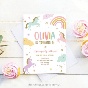 May include: A pink, yellow, and blue unicorn birthday party invitation with a rainbow, clouds, and stars. The invitation says "Olivia is turning 8!" and includes the date, time, and location of the party.