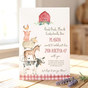 May include: A white birthday invitation card featuring a watercolor illustration of a red barn and a stack of farm animals including a cow, donkey, sheep, pig, and chicken. The text reads Oink Oink, Moo & Cockadoodle Doo, MASON, 2ND BIRTHDAY.