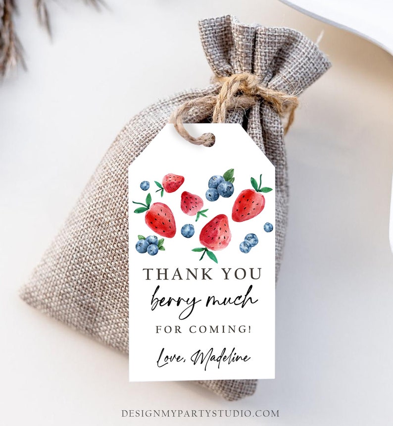 May include: White thank you tag with a watercolor design of strawberries and blueberries. The text reads "Thank you berry much for coming! Love, Madeline".