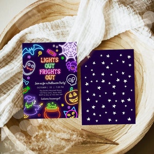 May include: A Halloween party invitation with a neon design. The front features a purple background with Halloween-themed illustrations and the text "LIGHTS OUT FRIGHTS OUT". The back has a dark purple background with white stars. The invitation is on a wooden tray.