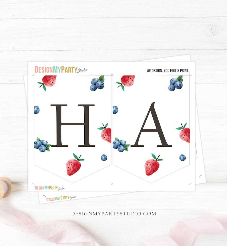 May include: Printable banner with the word "HA" in black letters on a white background. The banner is decorated with red strawberries and blue blueberries.