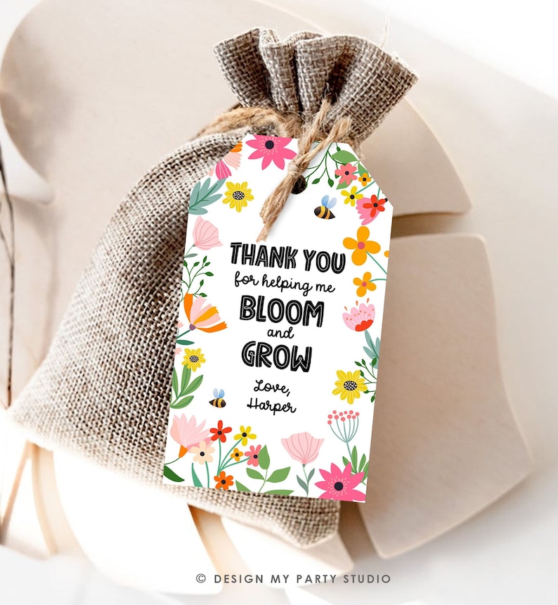 May include: A white gift tag with a floral design and the text "THANK YOU for helping me BLOOM and GROW Love, Harper".
