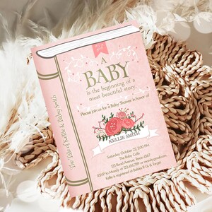 May include: Pink baby shower invitation with a book design. The text reads "A Baby is the beginning of a most beautiful story."  Please join us for a Baby Shower in honor of Kellie Smith. Saturday October 22, 2:00 PM. The Baby Cafe. 123 Road Avenue, Texas 4567. RSVP to Mandy at 123.456.789 or mandygmail.com. Kellie is registered at Babies R Us & Target.