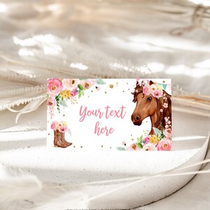 May include: Printable party favour tag featuring a brown horse wearing a pink floral crown, pink cowboy boots, and pink flowers. The tag has a white background with gold glitter and the text "Your text here".