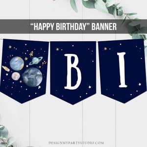 May include: A navy blue banner with white letters spelling "Happy Birthday" with a space theme. The banner features planets, stars, and a rocket ship.