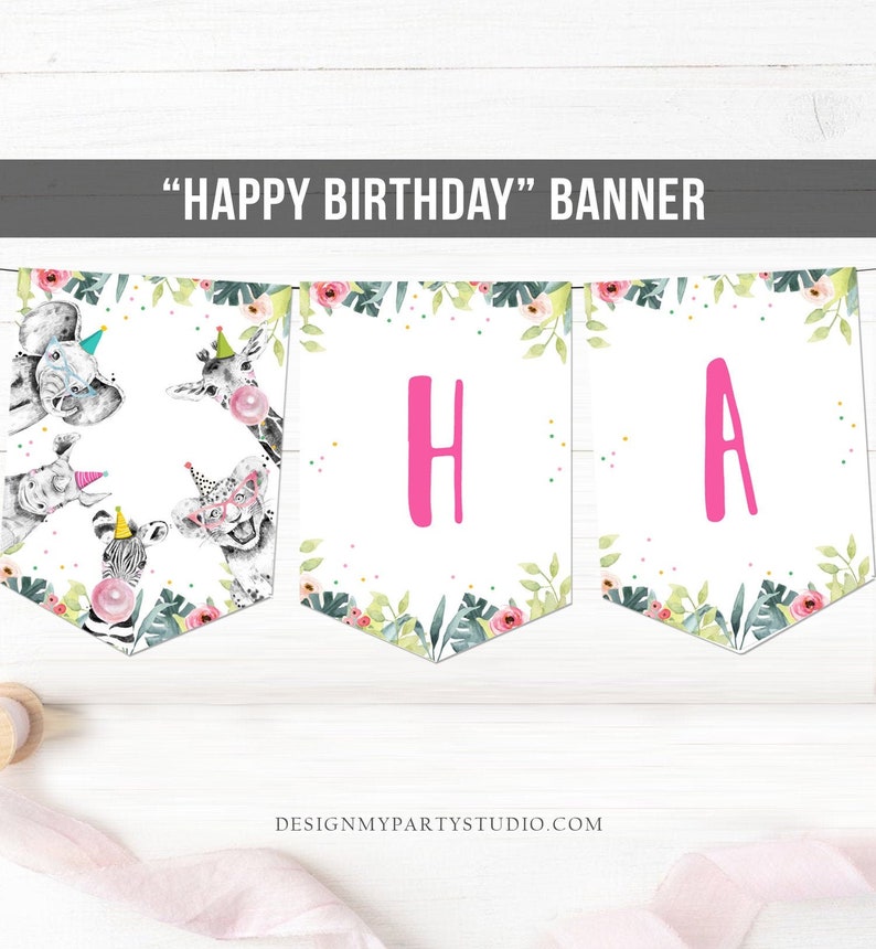 May include: A white banner with the text "HAPPY BIRTHDAY" and animal illustrations. The banner features pink letters, watercolor animal illustrations, and floral and leaf accents. The banner is designed for a party.