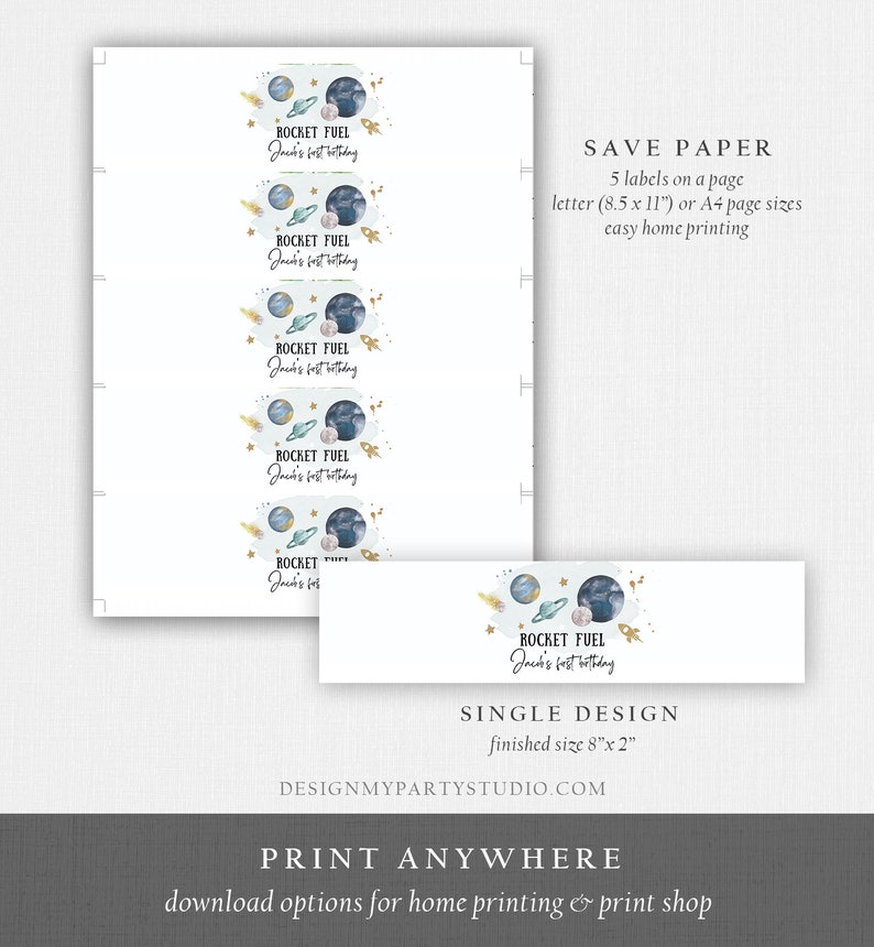 May include: Printable labels for a space-themed party. The labels feature a blue and gold watercolor design with planets, stars, and a rocket. The text on the labels reads "Rocket Fuel Jack's 1st Birthday". The labels are designed to fit on a standard 8.5 x 11 inch sheet of paper. Save paper and print at home.