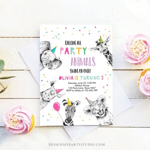 May include: A colorful party invitation with a pink, blue, and green background. The invitation features a variety of animals wearing party hats, including an elephant, giraffe, rhinoceros, zebra, and lion. The text on the invitation reads "Calling all Party Animals Swing on Over! Olivia is turning 3 Saturday, June 22, 2:00 PM Ashley's House 123 Party Lane, Texas 4567 RSVP to Ashley at 123.456.789".