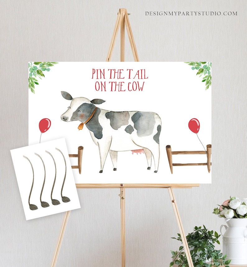 Puede incluir: Un juego imprimible para una fiesta con tem&aacute;tica de granja. El juego se llama "Pin the Tail on the Cow". El juego incluye una vaca blanca y negra con un globo rojo y una cerca. Hay cinco colas grises para poner en la vaca.