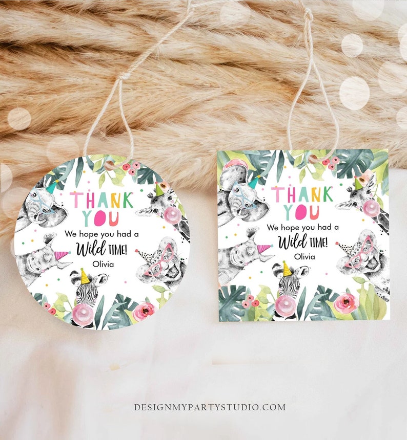 May include: Two safari-themed gift tags with string. One is round, the other square. Both feature watercolor illustrations of safari animals, floral accents, and the text "THANK YOU, We hope you had a Wild Time! Olivia."