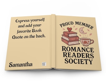 May include: Open book with a tan cover. The left side reads "Express yourself and add your favorite Book Quote on the back." The right side says "PROUD MEMBER ROMANCE READERS SOCIETY" with a stack of books, a heart, a crescent moon, and a teacup.
