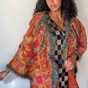 Rare 1960’s hippie juta floral overcoat with quirky fluffy collar. Fits all sizes