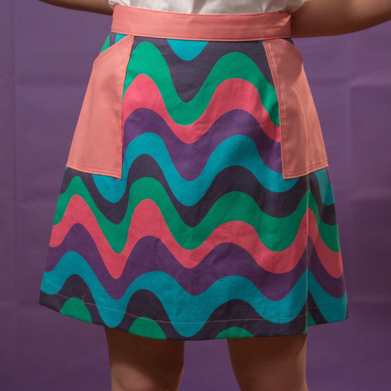 60s style psychedelic wave print mini a-line skirt pink, blue, green, purple, navy image 1