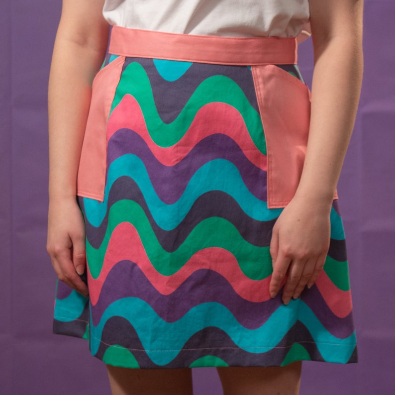 60s style psychedelic wave print mini a-line skirt pink, blue, green, purple, navy image 2