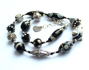 Glass bead necklace "black-natural-sand" made of Murano glass with real silver beads from Bali, stainless steel, 925 silver; handmade by PERSICO