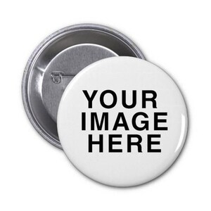 May include: A white button with a silver metal back. The button has black text that says "YOUR IMAGE HERE".