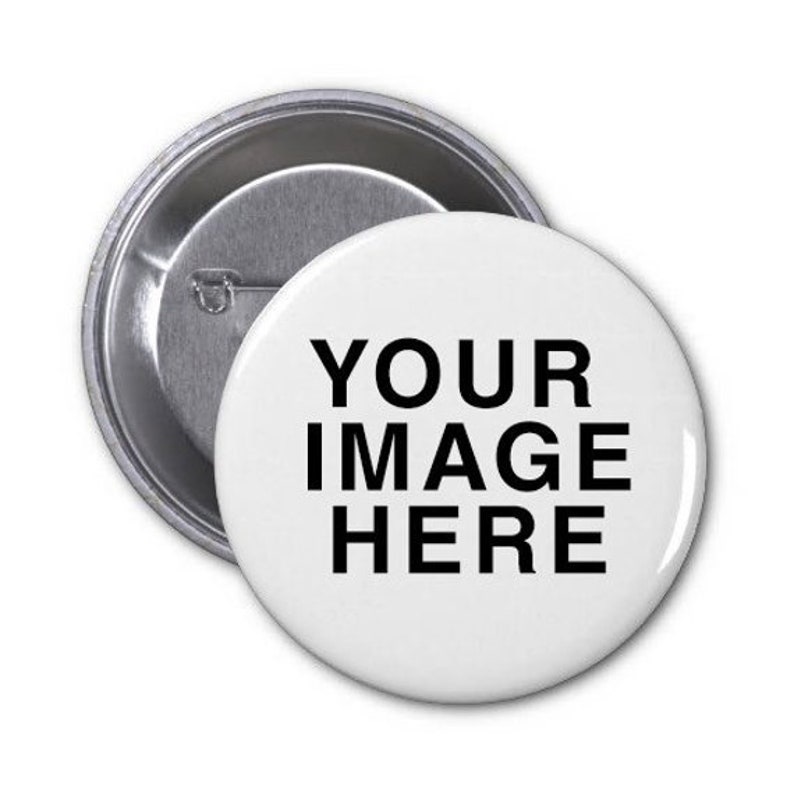 May include: A white button with a silver metal back. The button has black text that says "YOUR IMAGE HERE".