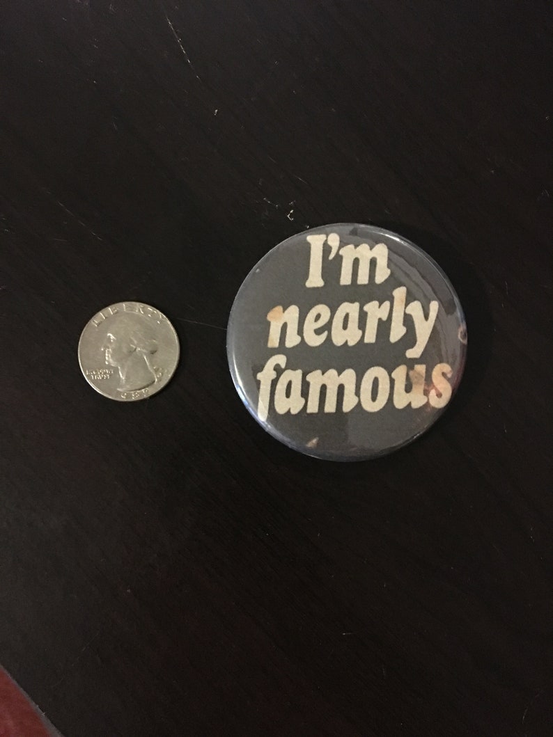 May include: A gray button with the text "I'm nearly famous" in white.