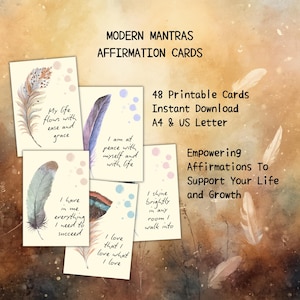 May include: A set of Modern Mantras affirmation cards featuring watercolor feather illustrations and text. The cards display phrases like My life flows with ease and grace, I am at peace with myself and with life, and I have in me everything I need to succeed.