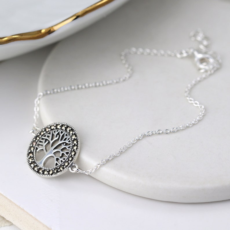 Sterling silver bracelet with a marcasite tree of life disc