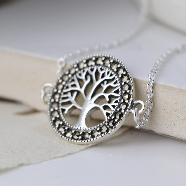 Sterling silver bracelet with a marcasite tree of life disc
