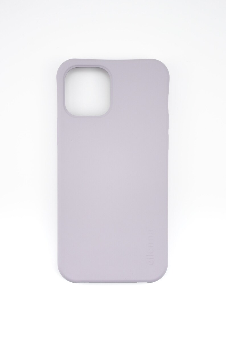 May include: A light purple silicone phone case with a raised camera bump and the word "casetify" printed on the bottom right corner.