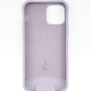 May include: A light purple phone case with a textured surface and a small logo on the back.