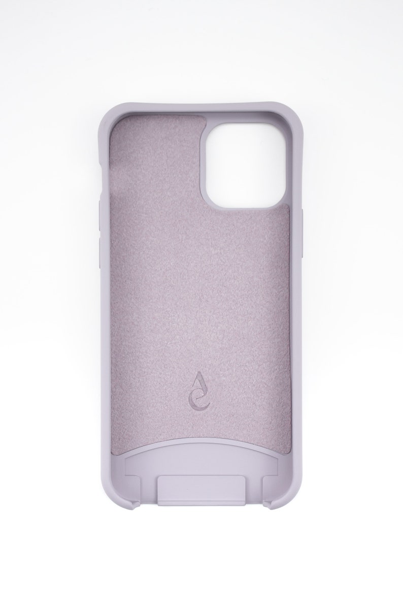May include: A light purple phone case with a textured surface and a small logo on the back.