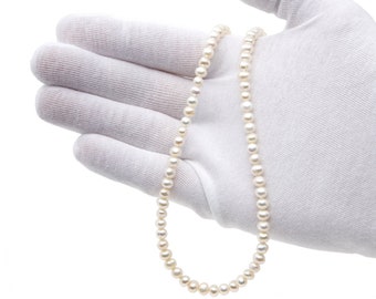 Freshwater Pearl necklace on silver strand in Various adjustable lengths presented in a gift box