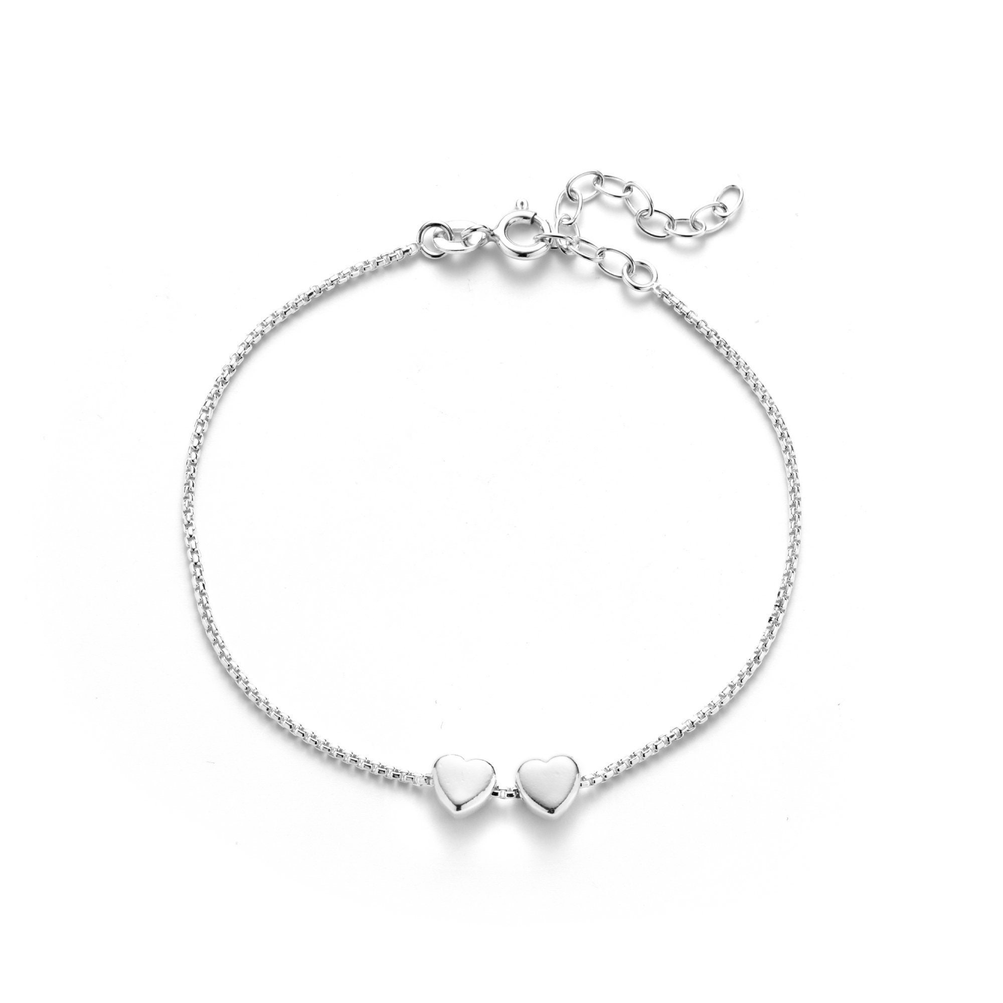 Sterling Silver Heart Charm Bracelet. Two Solid Hearts Side
