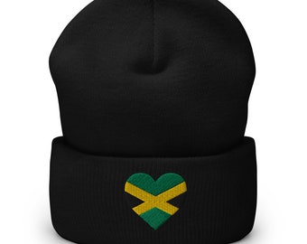May include: Black beanie with a heart-shaped embroidered patch featuring the Jamaican flag colors of green, yellow, and black.