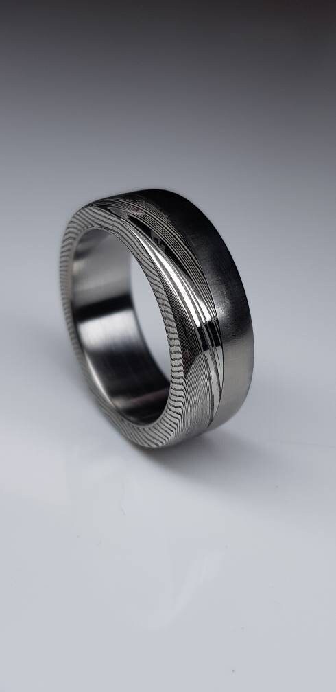 Solid pure Titanium rings with a stainless Damascus Steel | Etsy