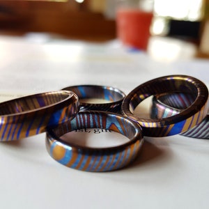 Quality Timascus rings. Polished, customizable and hypoallergenic.