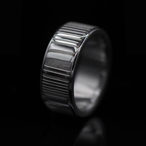 Exclusive, luxurious, highest quality & stainless straight patterned Damascus Steel lined in stainless steel. Hypoallergenic. Customizable.
