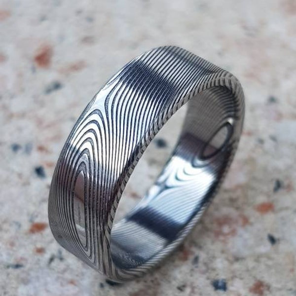 Luxurious, highest quality and stainless twisted Damascus Steel rings. Hypoallergenic. Customizable.