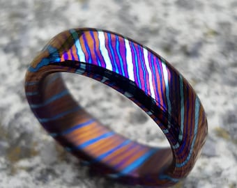 Highest quality Timascus rings. 3 alloys. Customizable. Mirror polished.