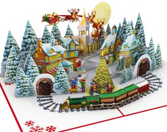 Carte pop-up 3D personnalisée Village de Noël avec le père Noël, le train et des sapins enneigés : une carte de vœux ou un cadeau parfait pour les fêtes