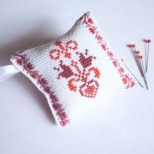 Needle pillow with peasant motif, hand embroidered