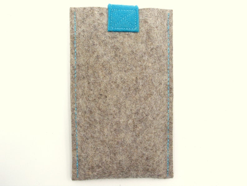 May include: A gray felt phone case with a blue felt flap closure.
