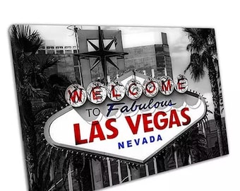 May include: Black and white photo of the iconic Las Vegas sign with palm trees in the background. The sign reads "Welcome to Fabulous Las Vegas, Nevada".