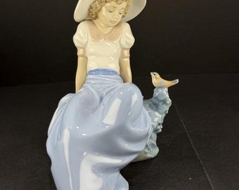 Figura vintage de Lladró Nao – Niña con pájaro, porcelana española