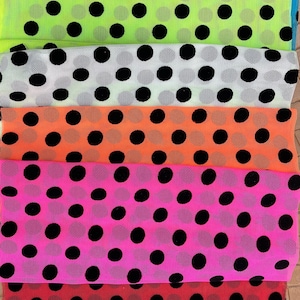May include: Six strips of black polka dot mesh fabric in different colors: turquoise, lime green, white, orange, pink, and red.