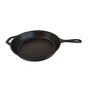 May include: A black cast iron skillet with a single handle. The skillet is empty and has a smooth, slightly textured surface.