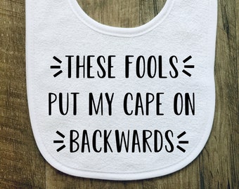 These Fools Put My Cape on Backwards - Baby Bib - Personalized - Customized - Baby Shower - Gift - Baby boy - Baby Girl - Funny - Superhero