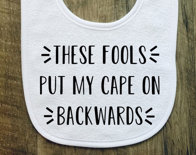 These Fools Put My Cape on Backwards - Baby Bib - Personalized - Customized - Baby Shower - Gift - Baby boy - Baby Girl - Funny - Superhero
